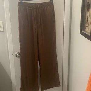 Satin wide leg relaxed fit pant.